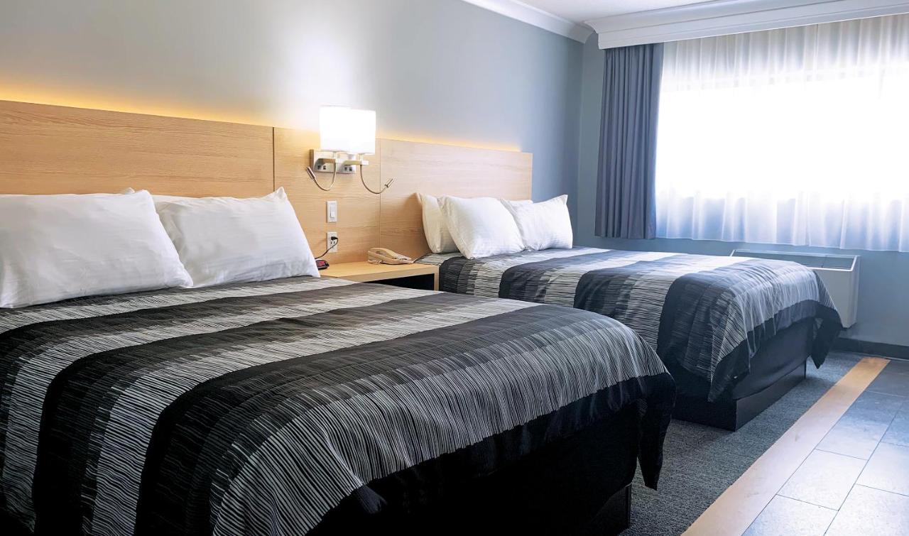 Chambre 2 Lits Queen-Size Deluxe - Accès au Parc Aquatique Inclus
